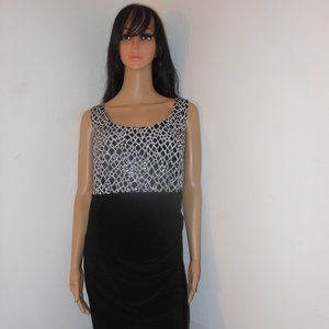 ESTABLISHED 1962 WOMAN BLACK & WHITE DRESS